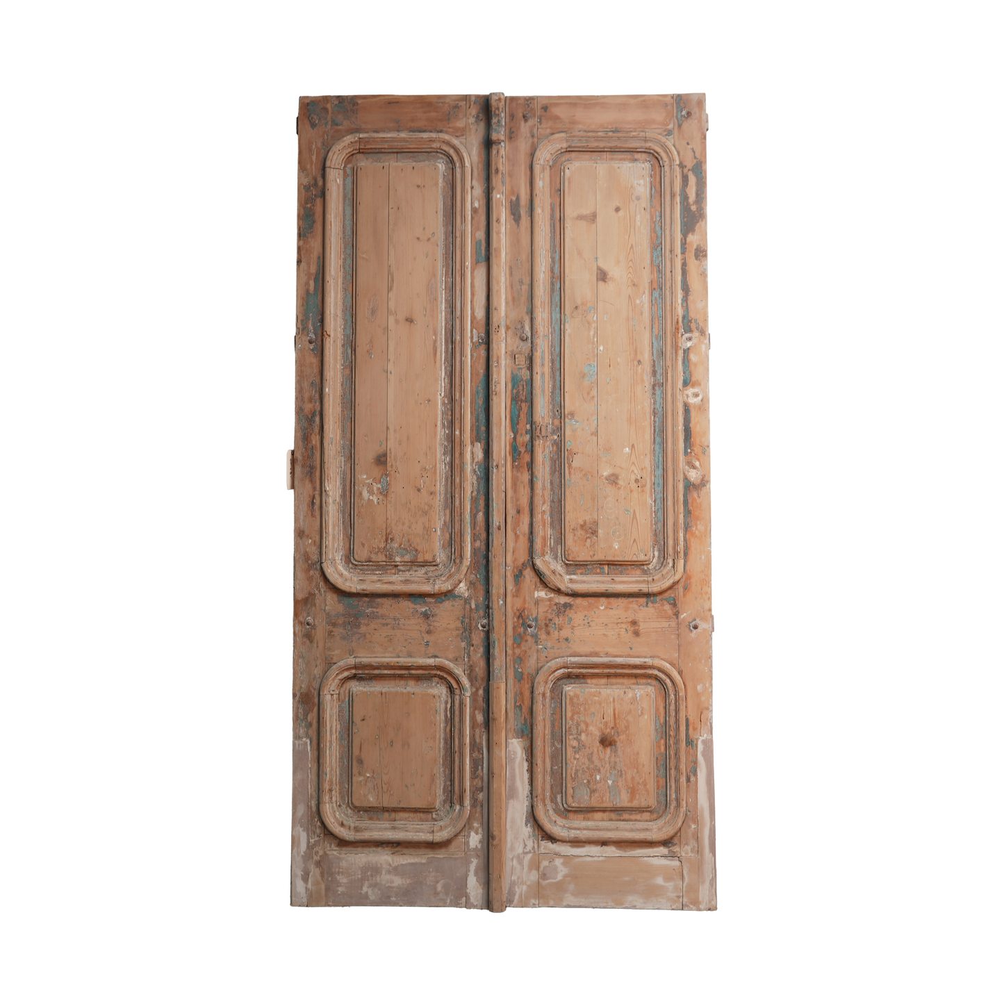 Pair of vintage wooden doors with intricate carvings on a white background