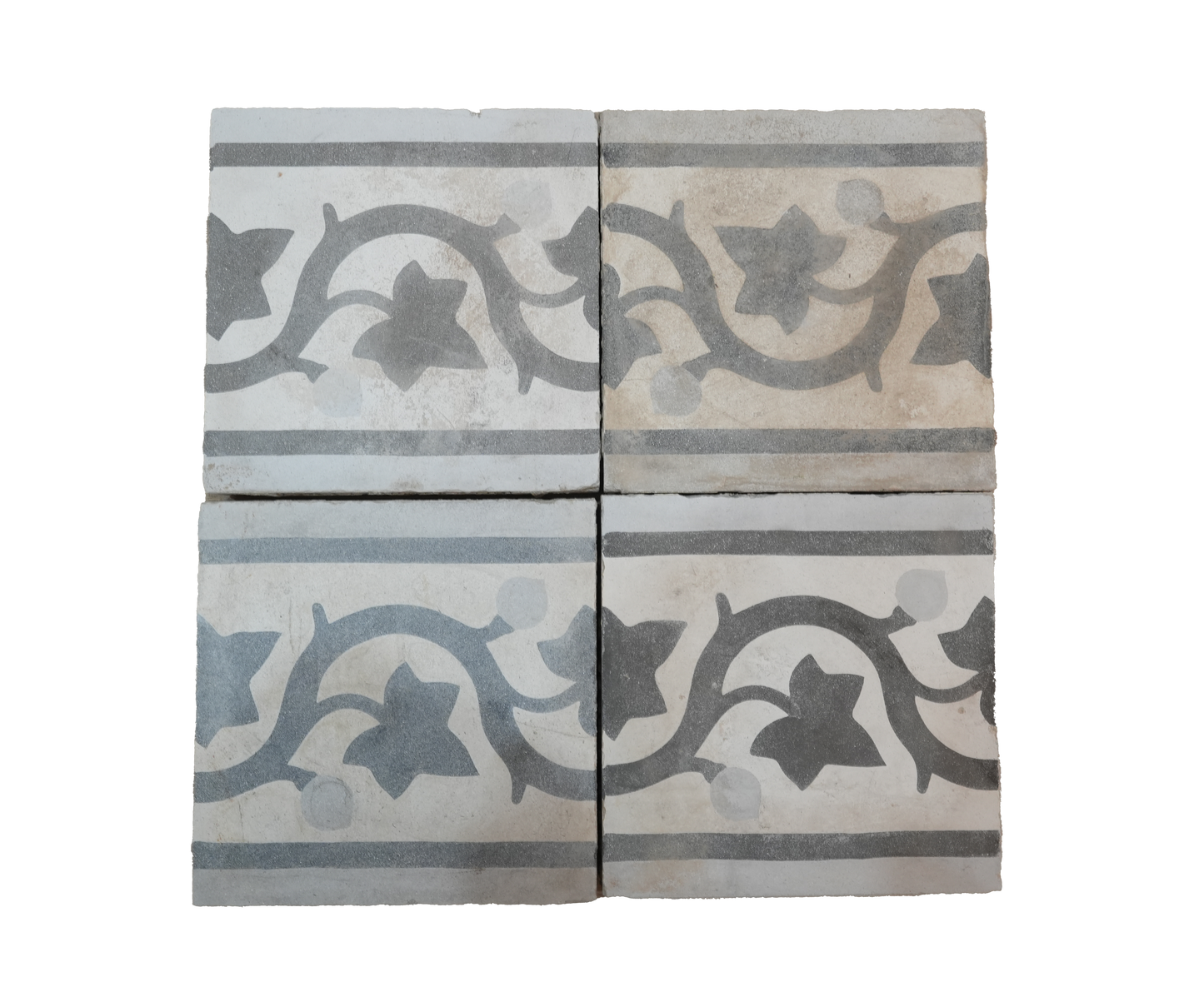 Decorative tiles with floral patterns on a white background