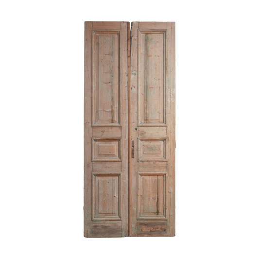 Pair of wooden doors with a rustic finish on a white background