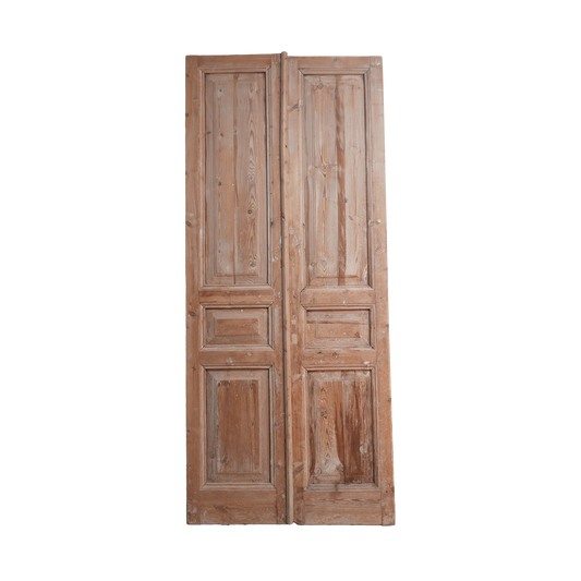 Pair of wooden doors with a rustic finish on a white background