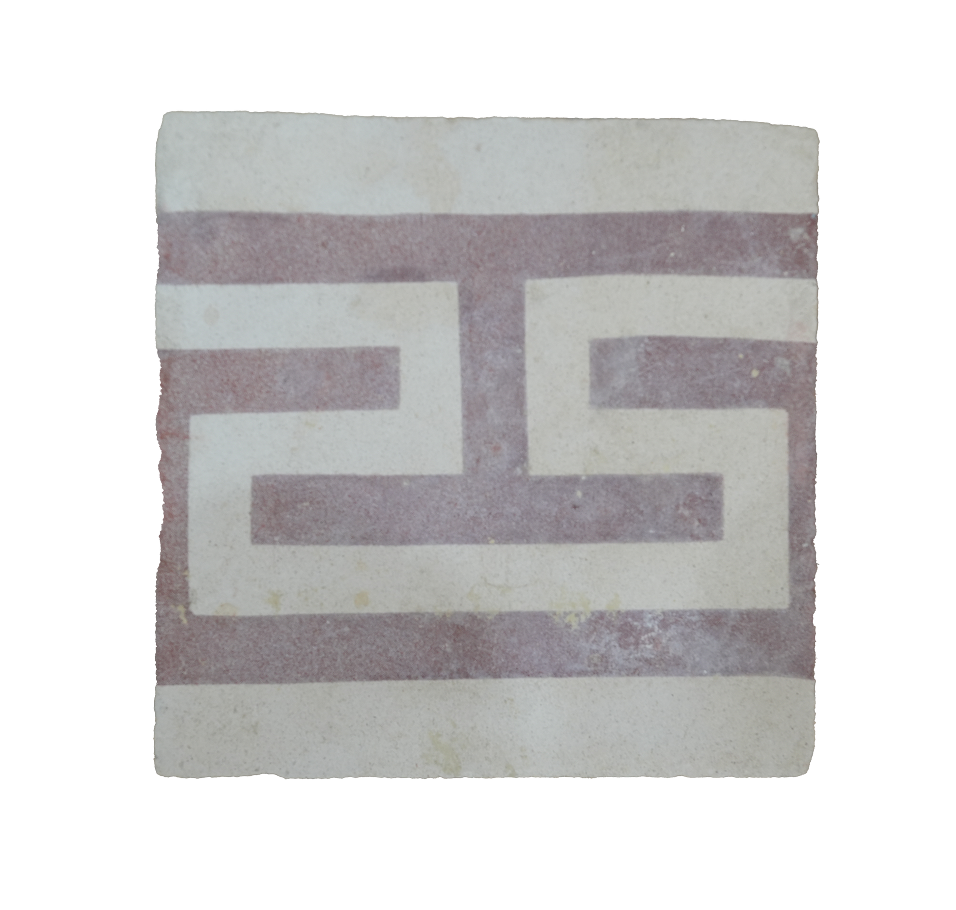 Decorative stone with a geometric pattern on a white background