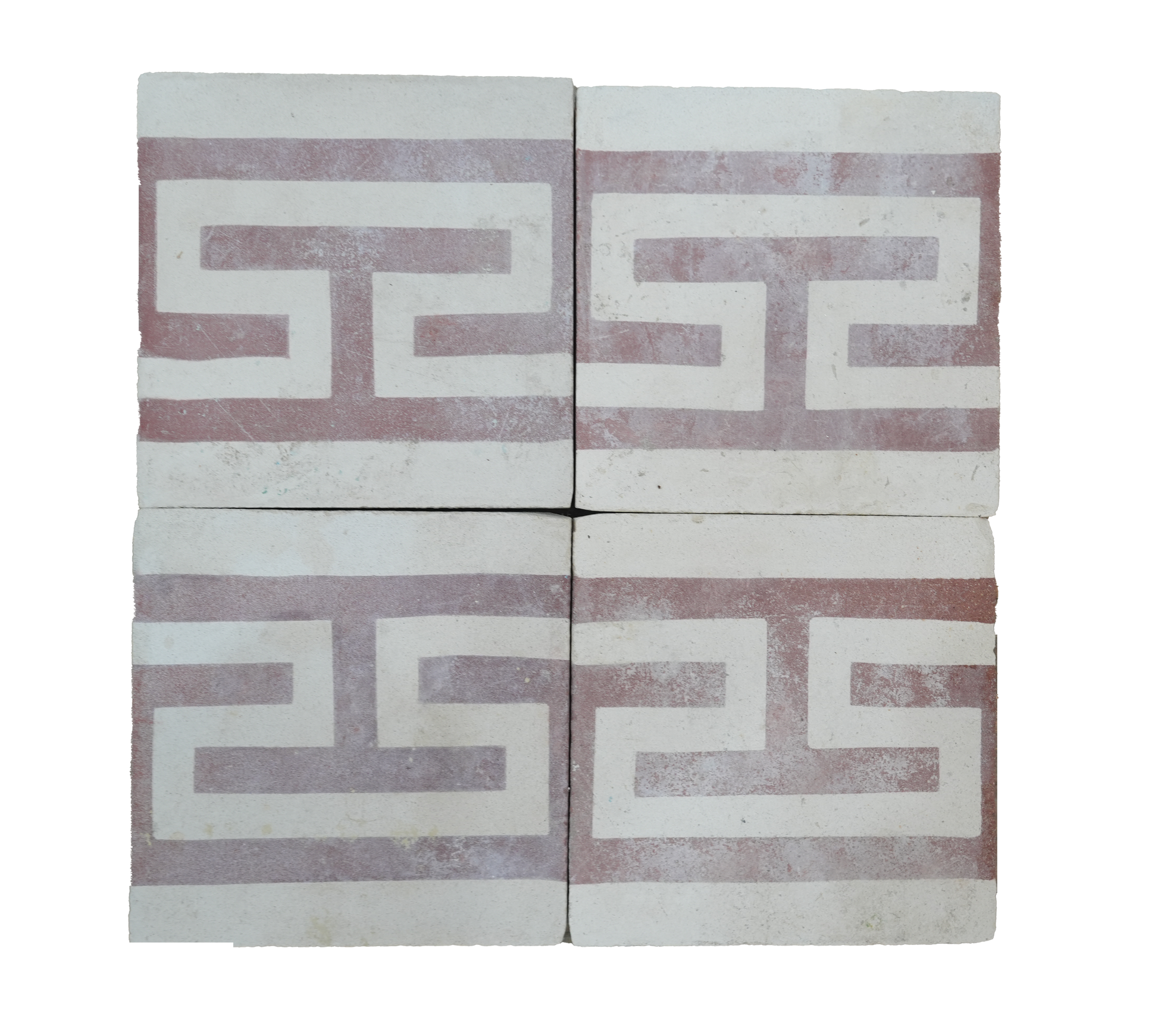 Two decorative tiles with a geometric pattern on a white background
