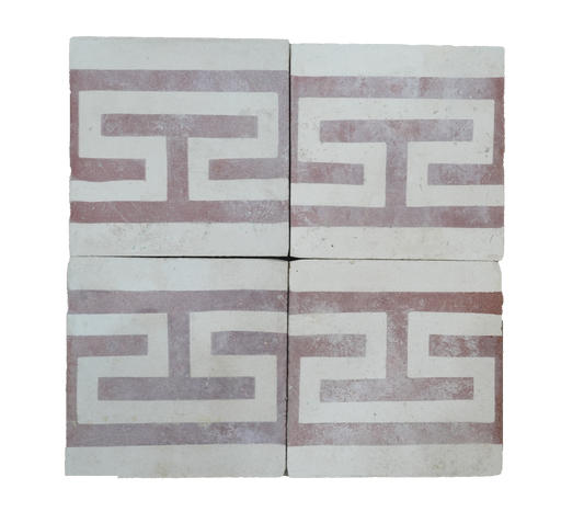 Two decorative tiles with a geometric pattern on a white background