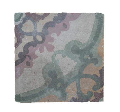 Decorative stone tile with intricate patterns on a white background