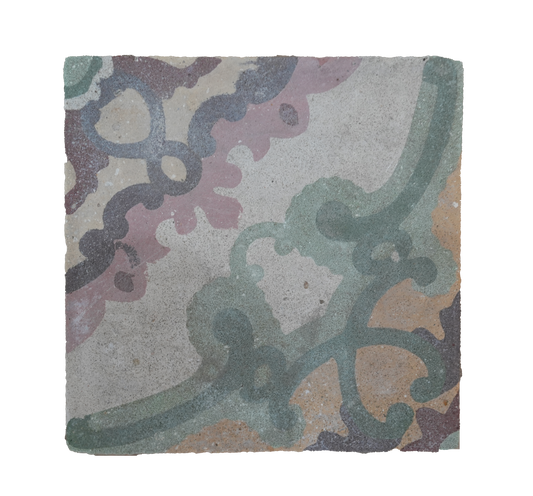 Decorative stone tile with intricate patterns on a white background