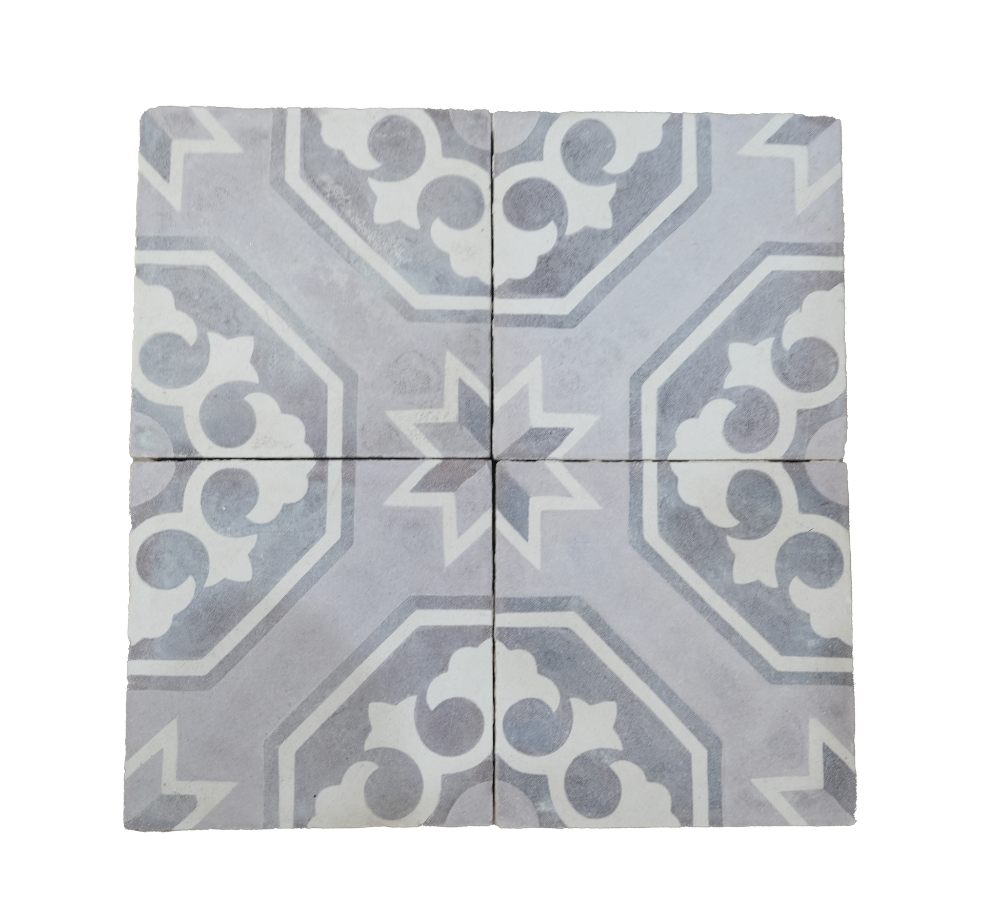 Decorative tile with geometric pattern on a white background