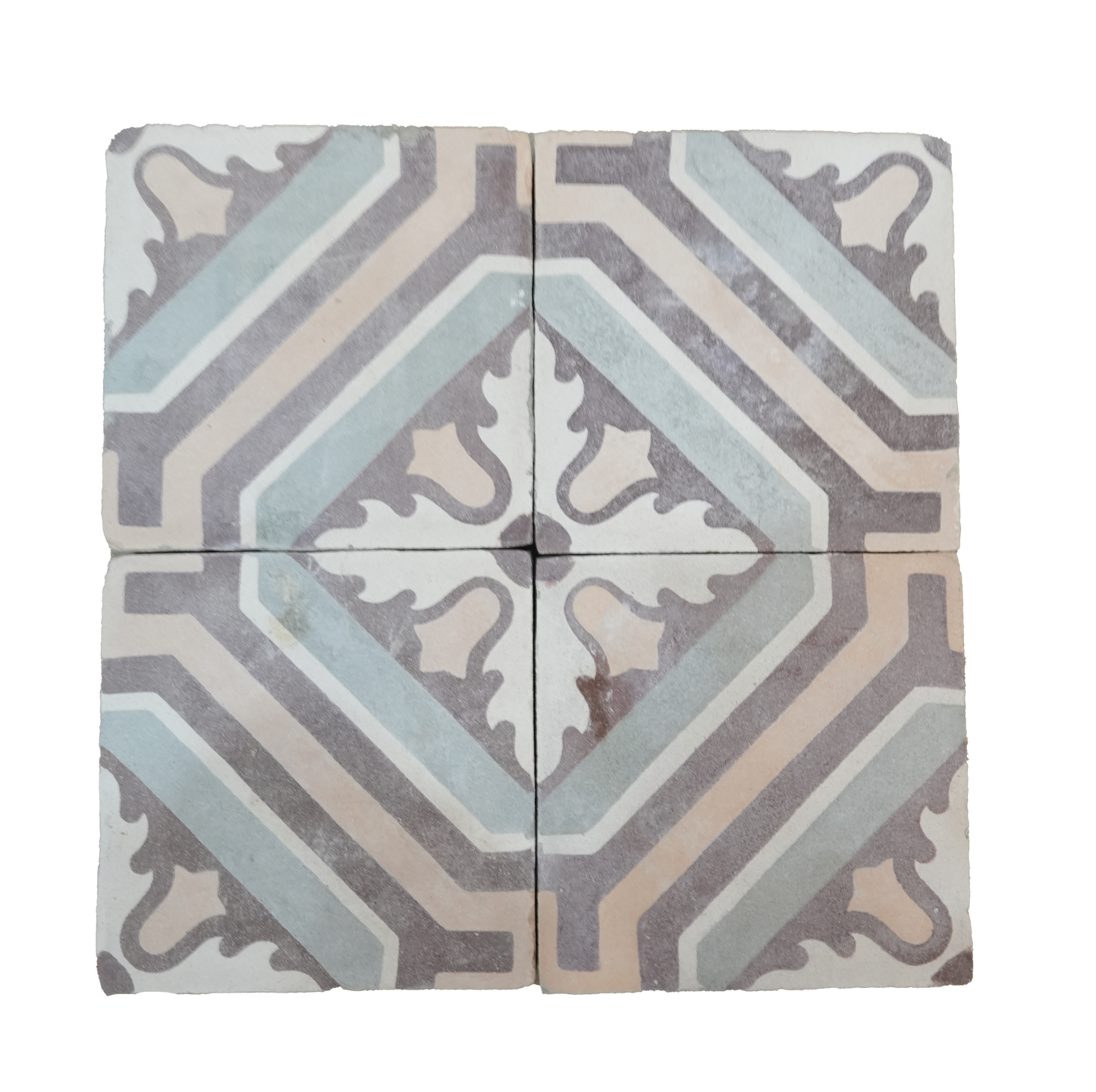 Decorative tile with geometric pattern on a white background