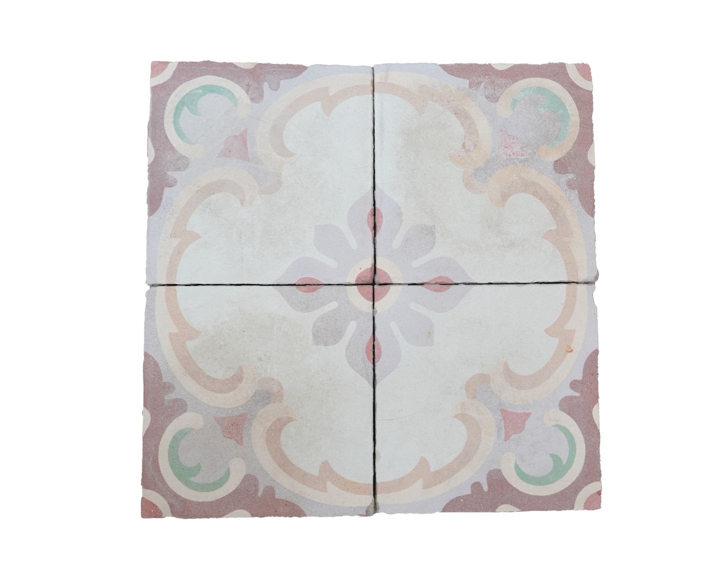 Decorative tile with a floral pattern on a white background
