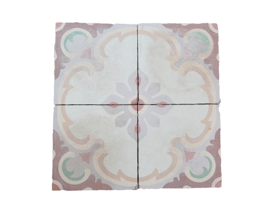 Decorative tile with a floral pattern on a white background