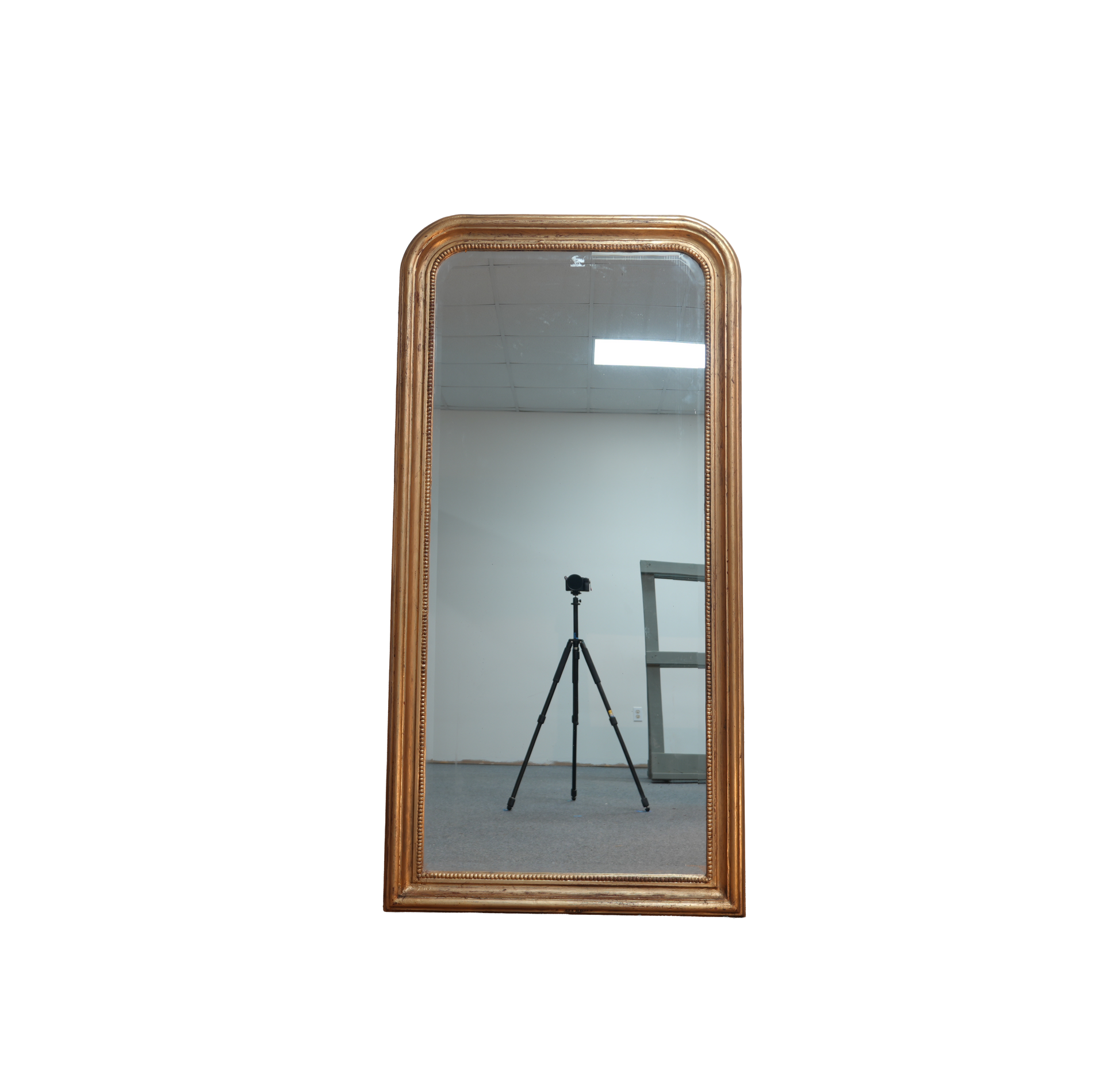 Wooden-framed mirror on a white background
