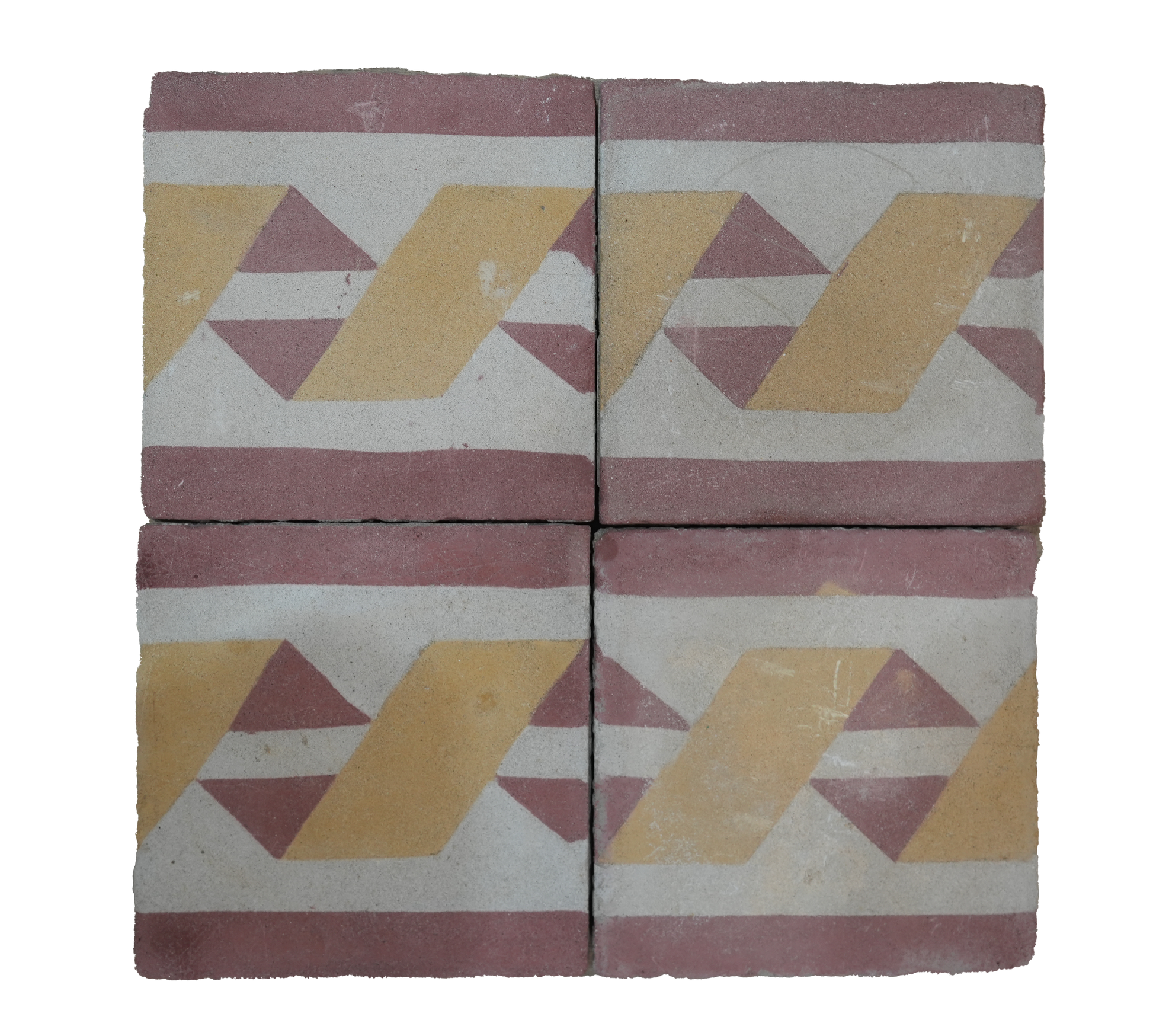 Two decorative tiles with geometric pattern on a white background