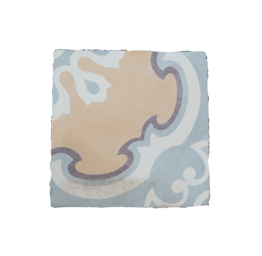 Decorative square pillow with a beige and blue pattern on a white background