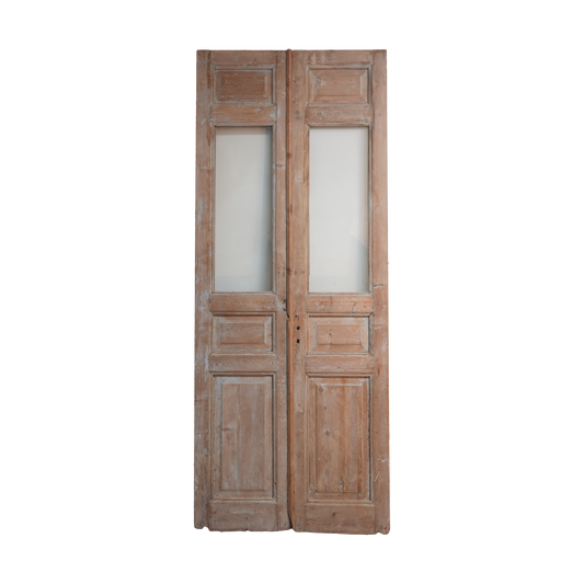 Pair of wooden doors with glass panels on a white background